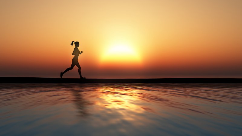 A minimalist silhouette of a person in motion, surrounded by an abstract golden glow representing the release of hope molecules during exercise.