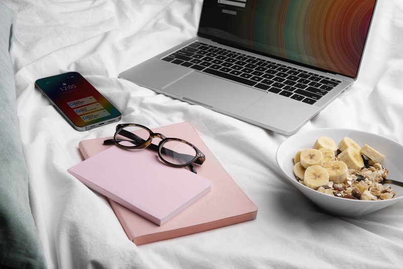 A minimalist desk with a notebook and small tools in warm light, symbolizing a calm mind kept meaningfully occupied